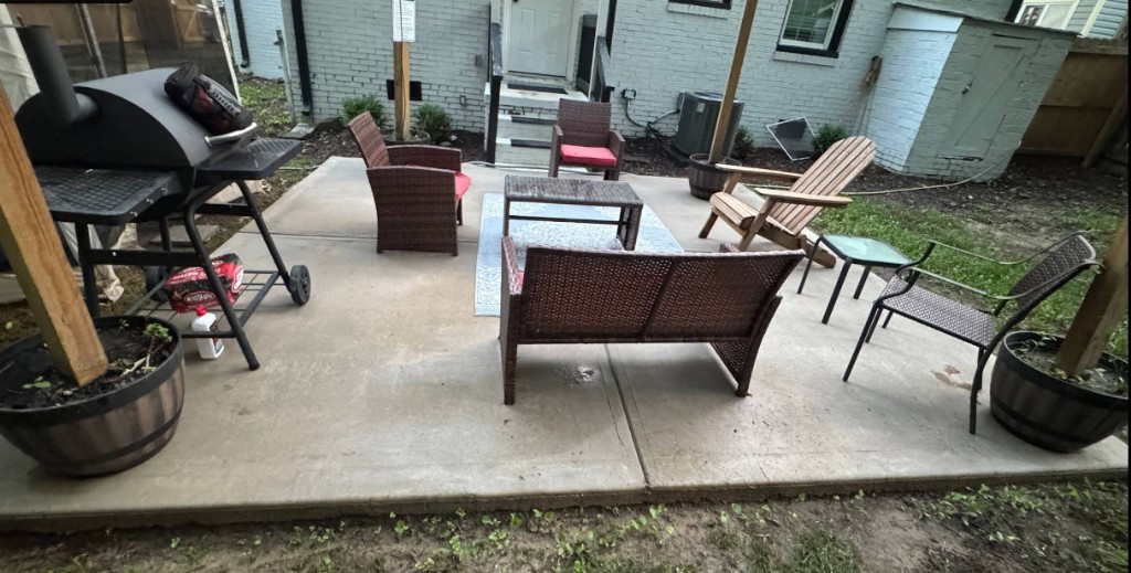 Professional pressure washing service on a residential exterior in Ellenwood, GA